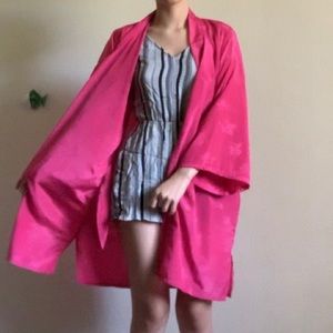 Pink silky robe with reflective floral pattern